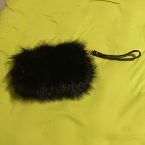 Black fur evening clutch.